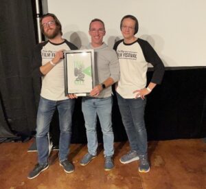 Joshua Lightle, (center), Chairperson of the Tree City Film Festival